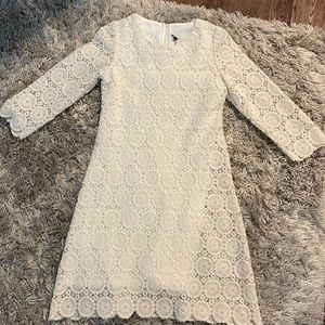 A cream whit dress in youth size 14 from small boutique in blue ridge georgia.